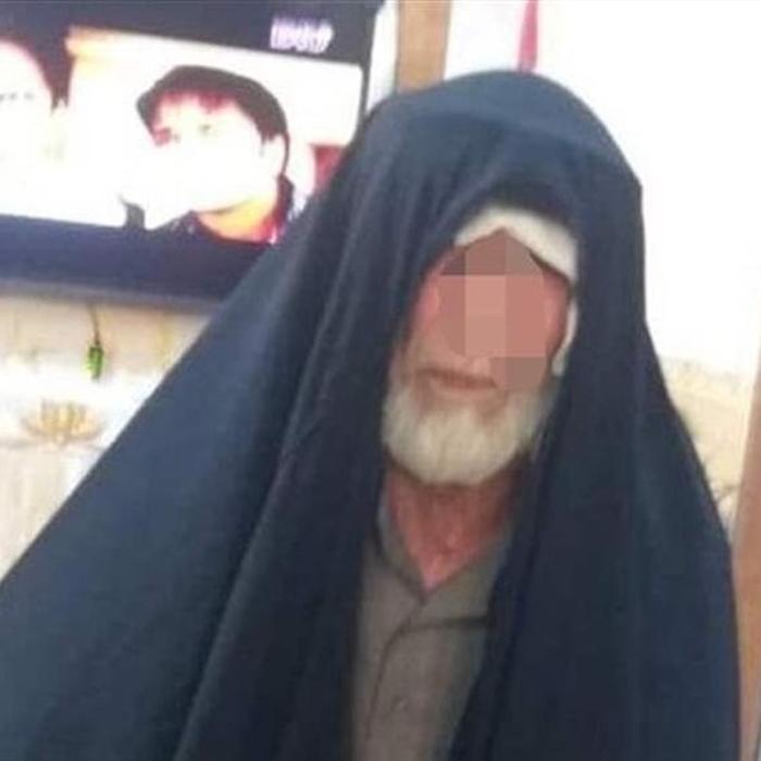 شیطان واقعی داعش با لباس زنانه دستگیر شد عکس