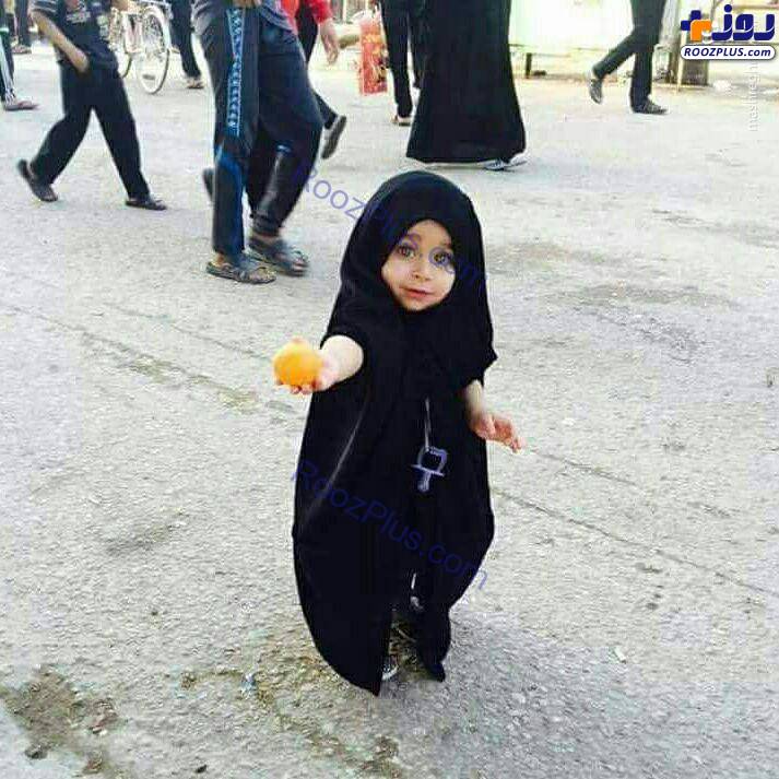 عکس/دختری زیبا که خادم اربعین حسینی شد