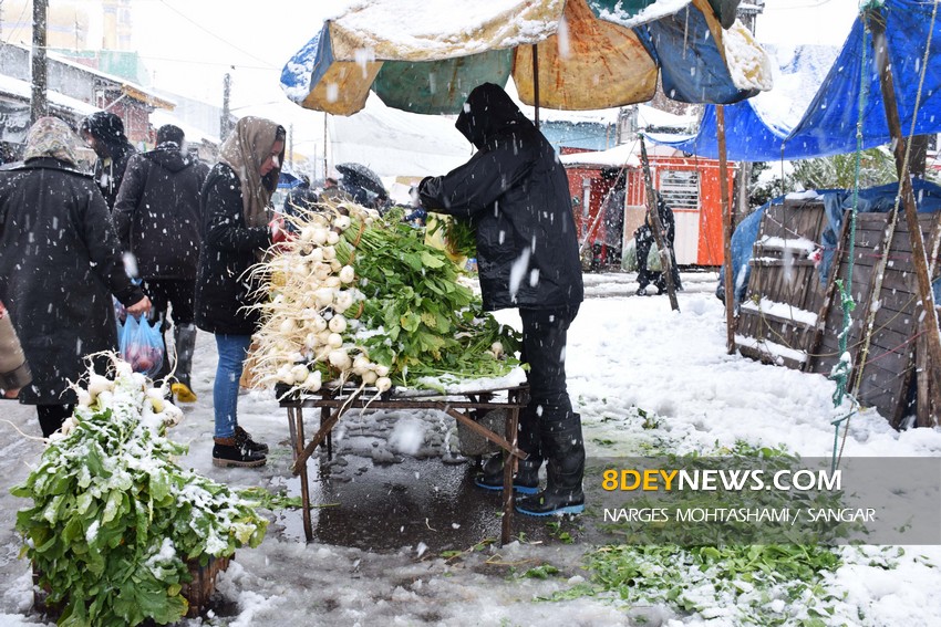 گزارش تصویری/ دوشنبه بازار سنگر در یک روز برفی 